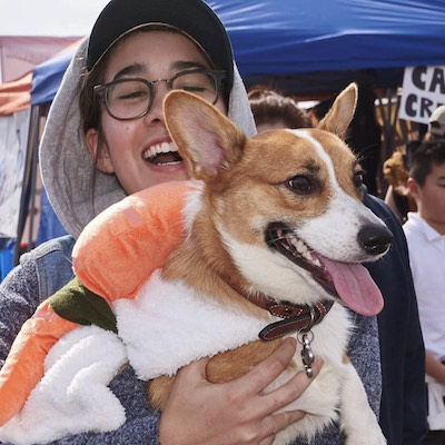 Photo of Kayla holding a dog